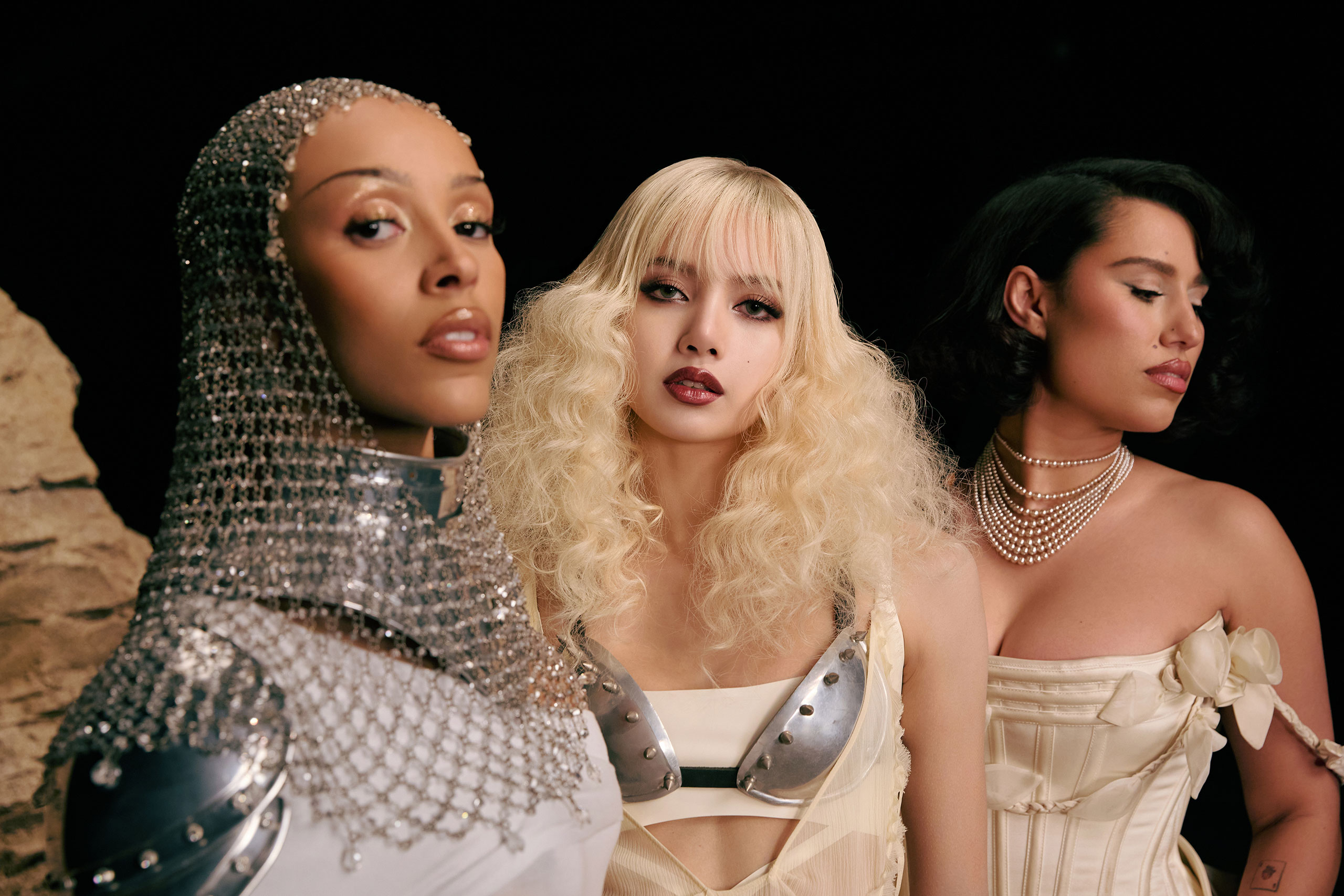 Lisa has teamed up with Doja Cat and RAYE for her new single ‘Born Again’