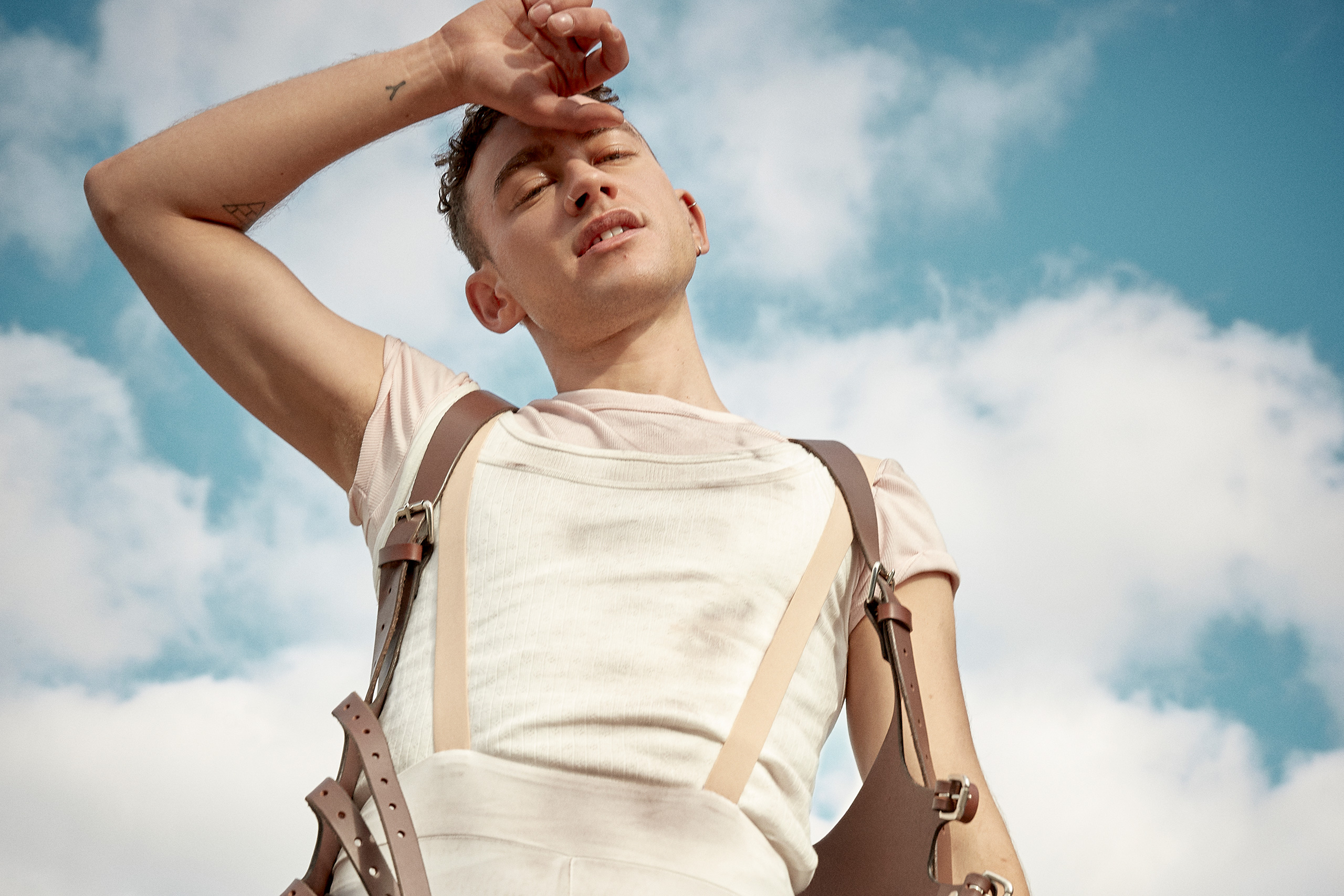 Olly Alexander is celebrating the release of his debut solo album ‘Polari’ with a new video for ‘Whisper In The Waves’