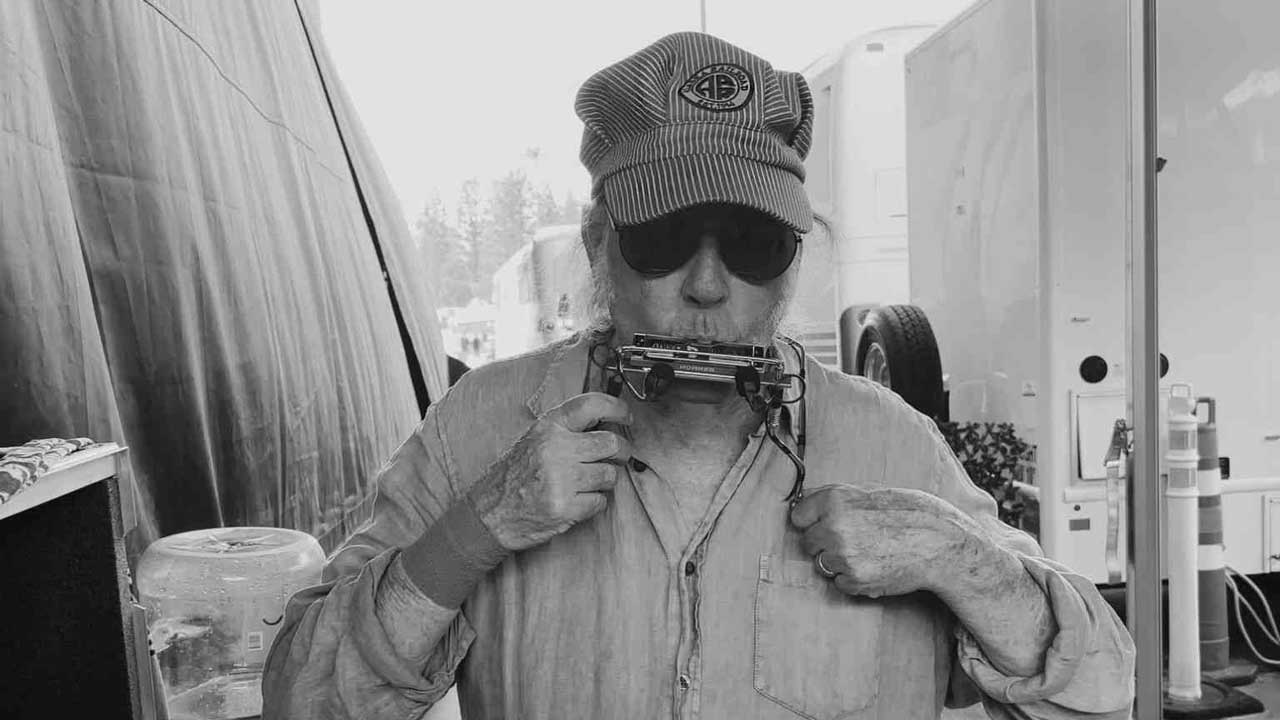 “An oddball genius proffering words of hope as the world burns”: Neil Young And The Chrome Hearts take aim at Trump & Co. on Talkin To The Trees