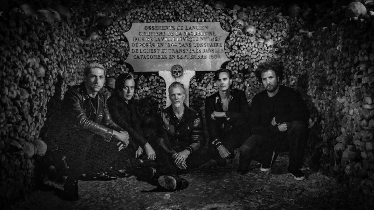 “Appropriate dress is encouraged for this very special evening at the theatre”: Queens Of The Stone Age announce UK and European shows