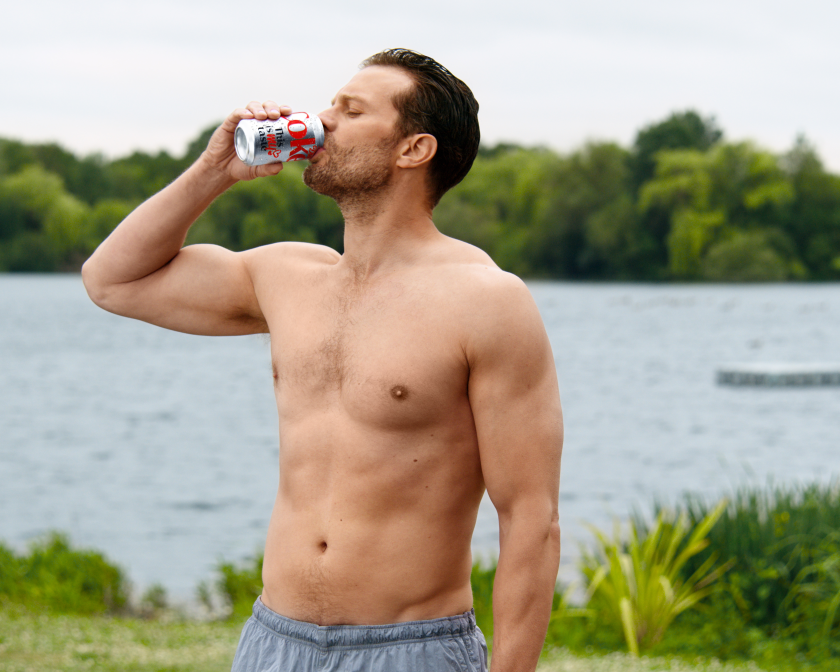 Jamie Dornan swaps slow-mo smoulder for cold-water swim in Diet Coke’s latest break