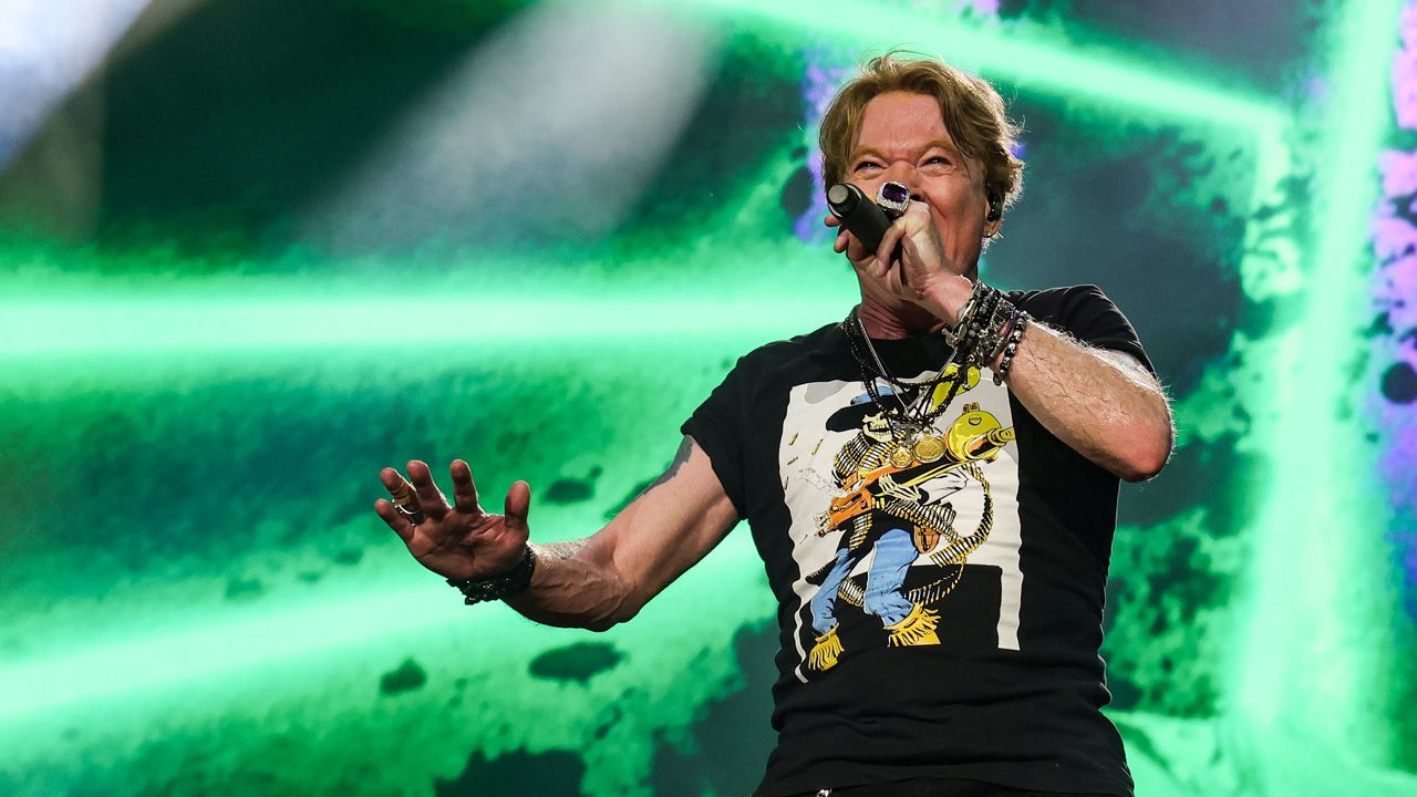 Watch Axl Rose kick drumkit and fling microphone before storming offstage in Argentina