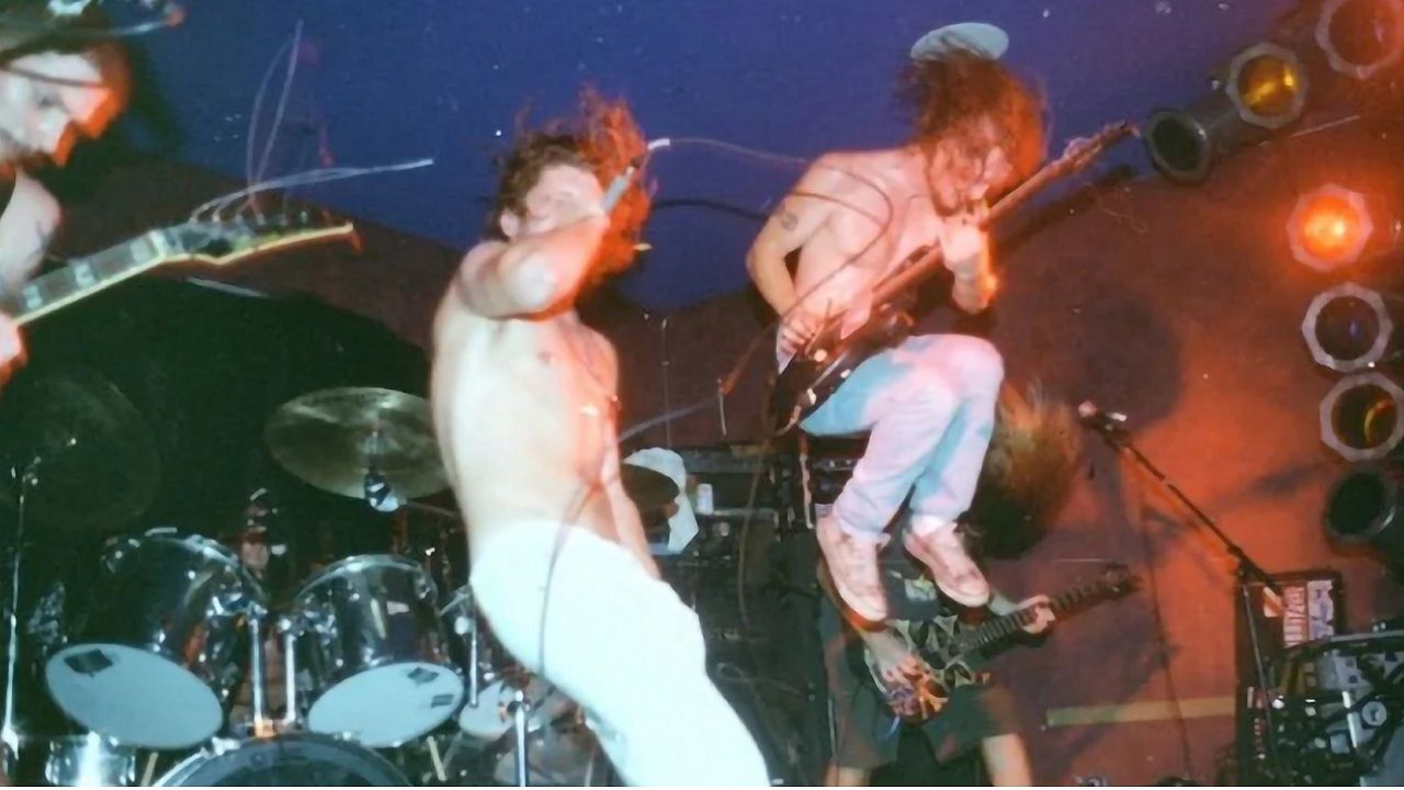 “It felt like my head was going to explode.” Alligator murder, police raids and abandoned adult theatres: the story of the chaotic video shoot that helped make an underground 90s band cult legends