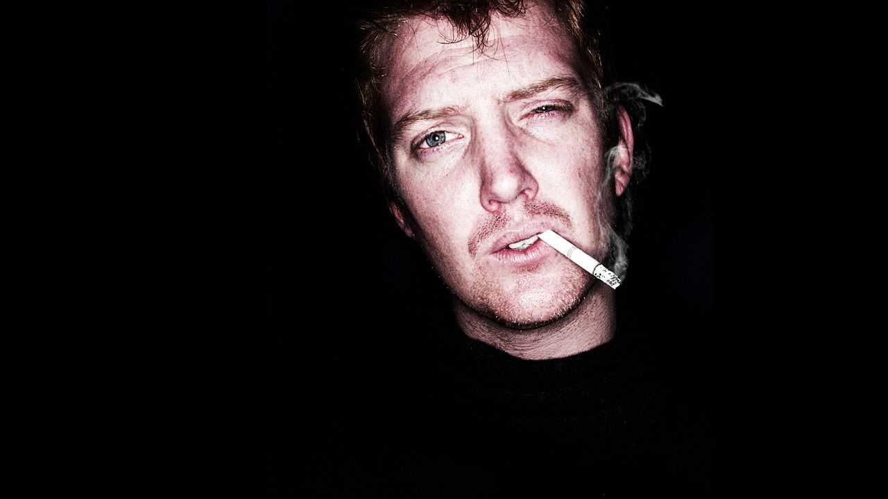 “He looked at the lyrics and goes, ‘Rock ’n’ roll cocktail – I think I invented that’!” How Queens of the Stone Age got a metal legend to sing on a single US radio would not touch
