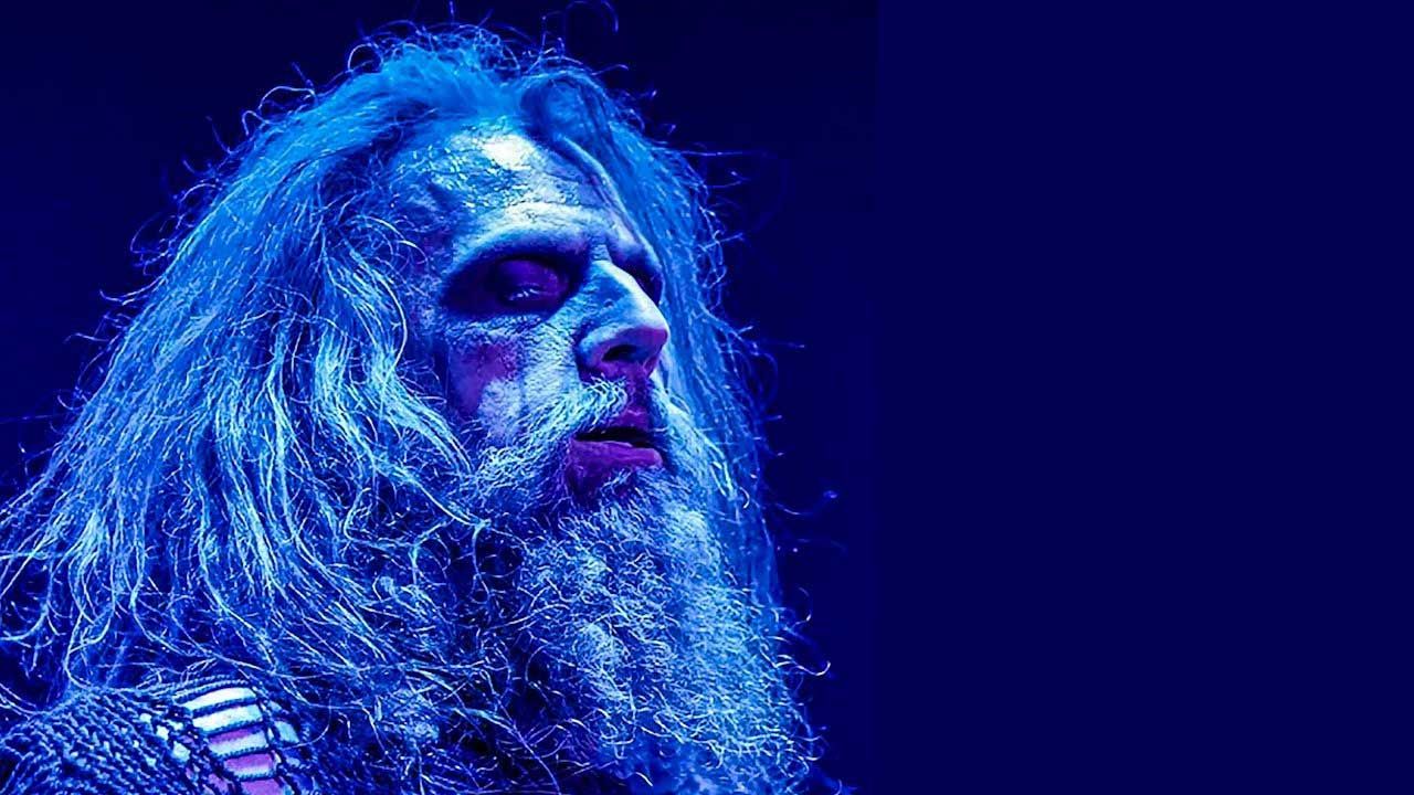 “Snatches of movie dialogue and trailers mixed with a musical wall of screaming guitars and stabs of distorted synth.” Rob Zombie goes full bore, full gore on blood-soaked eighth album The Great Satan
