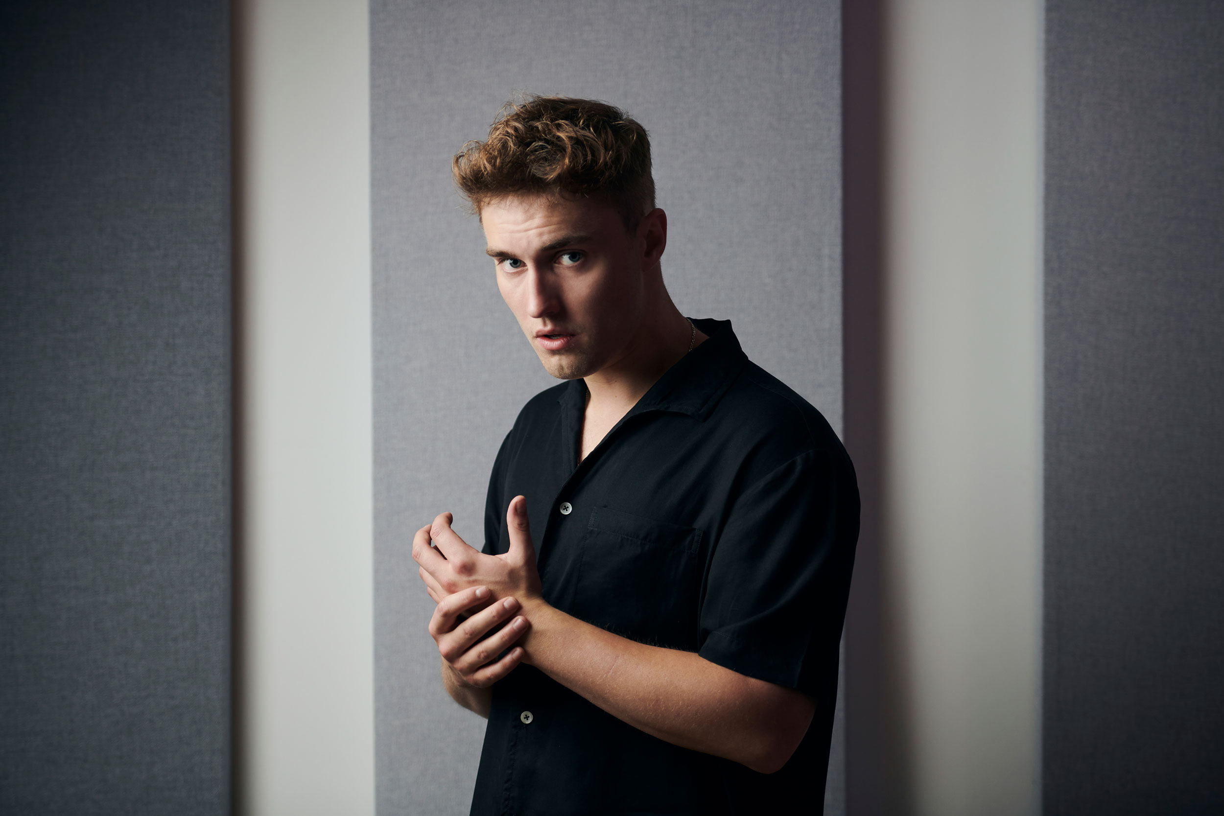 Sam Fender urges industry to seek out working class talent as Elton John salutes him at the Ivors