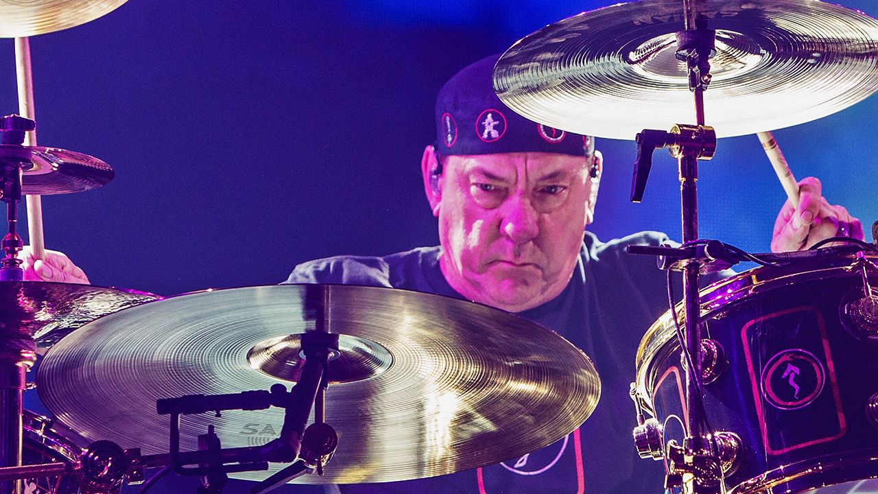 “It pissed Neil Peart off. He went back to his room and went, ‘F**k, f**k, f**k – I can’t say no to that guy!’” The one and only reason Rush’s R40 tour actually happened
