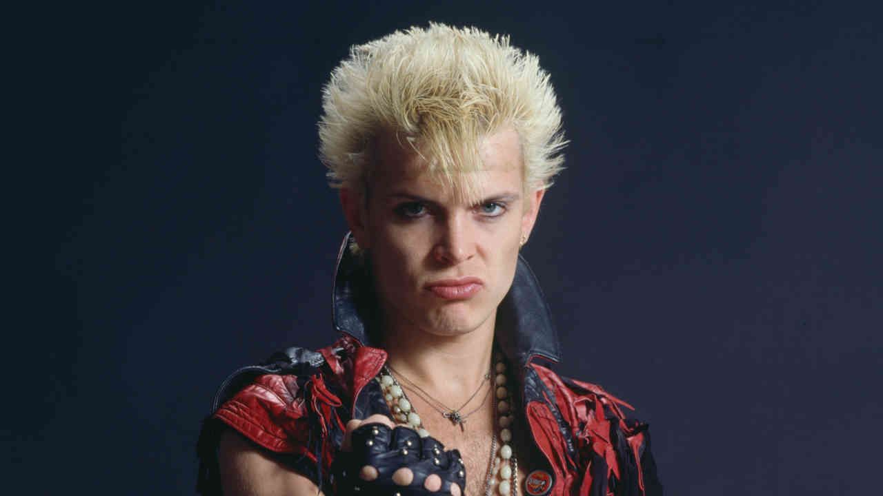 “We knew we could never do what Led Zeppelin were doing, but what if you’re not the greatest musician and still wanna do it?””: Billy Idol comes clean about religion, nearly losing a leg, and taking it to the edge and living to tell the tale