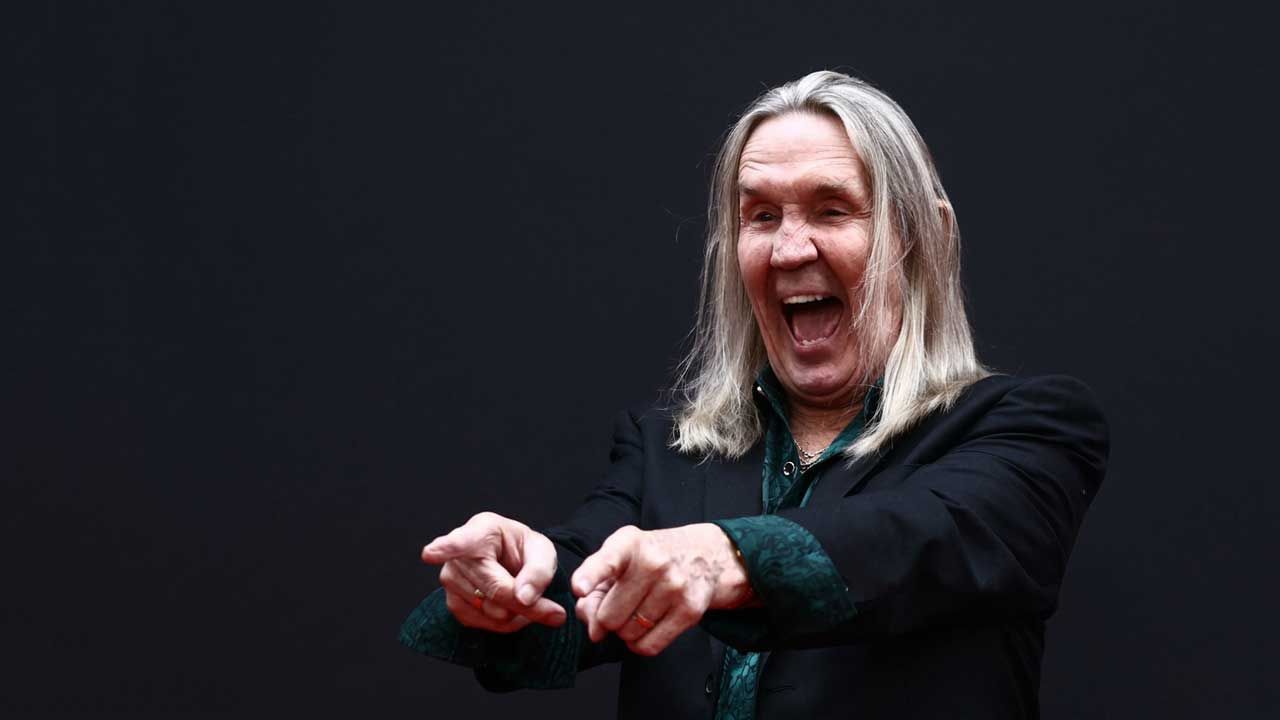 Iron Maiden drummer Nicko McBrain says he turned down the opportunity to play golf with Donald Trump